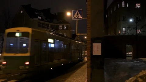 Commuter train at night in Helsinki 스톡 동영상 103606594