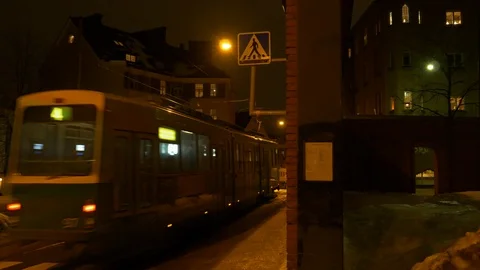 Commuter train at night in Helsinki 스톡 동영상 103606600