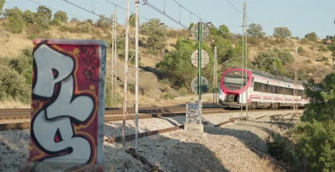 Commuter Train passes by PAN Stock Footage 204159261