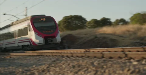 Commuter Train passes by PAN v2 Video stock 204159093