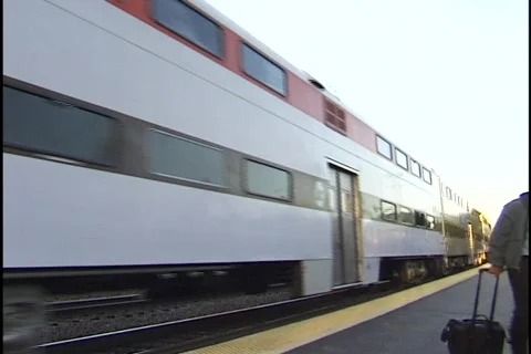Commuter Train Passes Station Stock Footage 297191