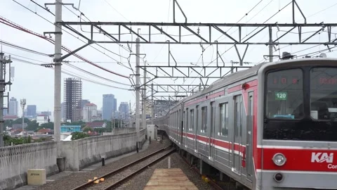 Commuter train passing the elevated train track Stock Footage 300543513