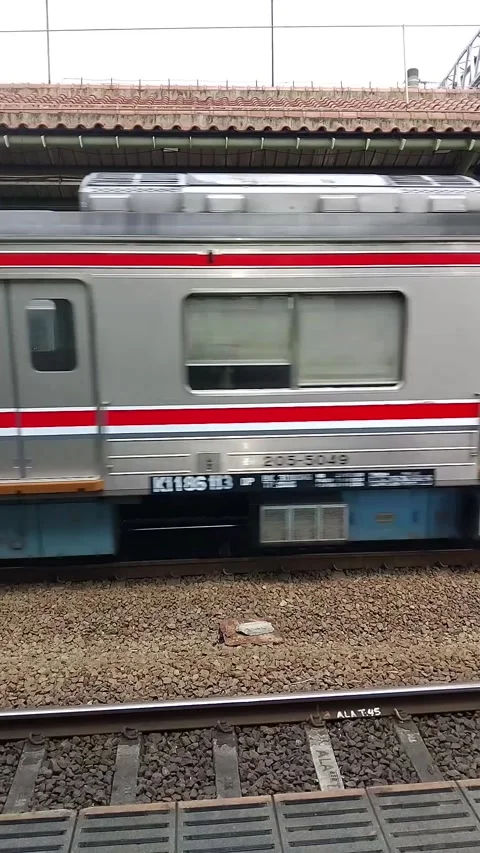 Commuter Train Passing Through Stock Footage 342103945