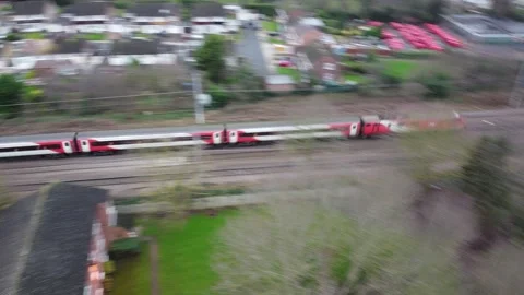 Commuter Train Passing Through North London Suburbs Stock Footage 135411392