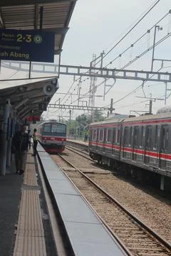 Commuter Train at Station Platform Stock Photos