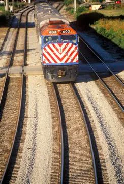 A commuter train in the West Loop area enters downtown Chicago. Stock Photos