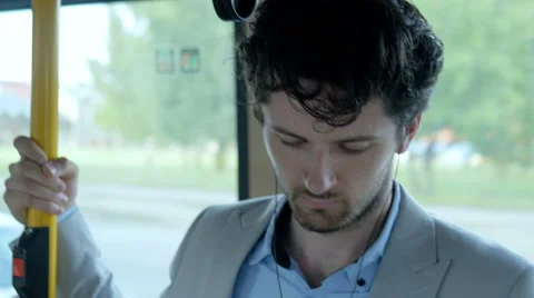 Commuter using a phone Stock Footage 67106065