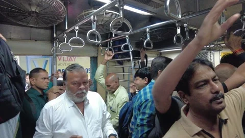 Commuters Board Train at Dadar railway Platform. 4K (Over crowded train) Stock Footage 253254987