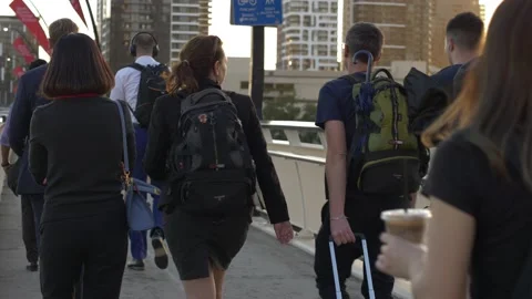 Commuters on a bridge slow motion 4K Stock Footage 164528538