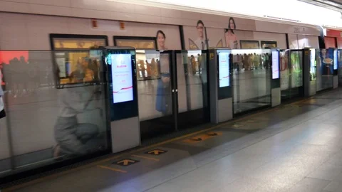 Commuters at BTS skytrain in Bangkok Stock Footage 122310213