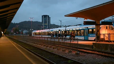 Commuters with coronavirus masks exiting train Stock Footage 170666068