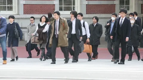 COMMUTERS CROSSING BUSY INTERSECTION MORNING RUSH HOUR IN TOKYO Stock Footage 59918364