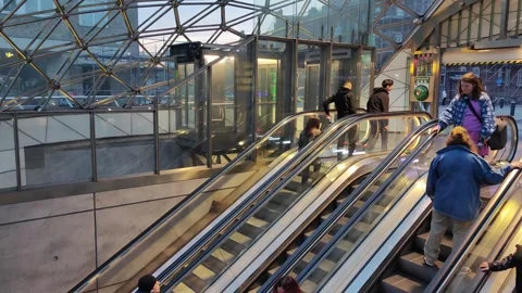 Commuters descend escalators at Malmo station Stock Footage 312975351