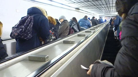 Commuters on esclator of underground Stock Footage 69859704