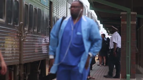 Commuters exit a train during afternoon rush, 1080p HD Stock Footage 47569580