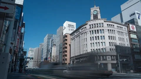 Commuters in Ginza District at Wako Department store. 4k time-lapse Stock Footage 126157553