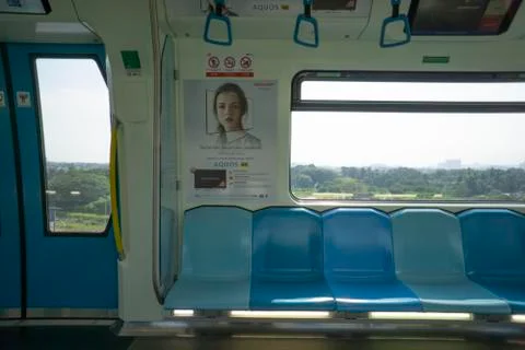Commuters on Mass Rapid Transit (MRT) train. Stock Photos