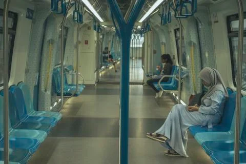 Commuters on Mass Rapid Transit (MRT) train. Stock Photos