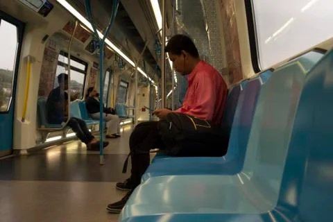 Commuters on Mass Rapid Transit (MRT) train. Stock Photos