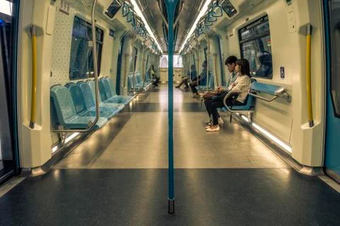 Commuters on Mass Rapid Transit (MRT) train. Stock Photos