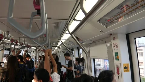 Commuters in Monorail train Stock Footage 272977394