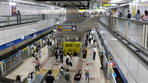 Commuters at MRT city train station in Taipei, Taiwan Stock Footage 264292939