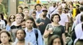 Commuters NYC large crowd business people walk pedestrians commute New York City HD Footage