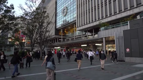 Commuters Outside JR Hakata Train Station in Fukuoka, Japan Stock Footage 268744145