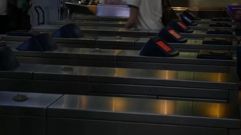 Commuters Passing Through Automatic Ticket Gate Stock Footage 340380800