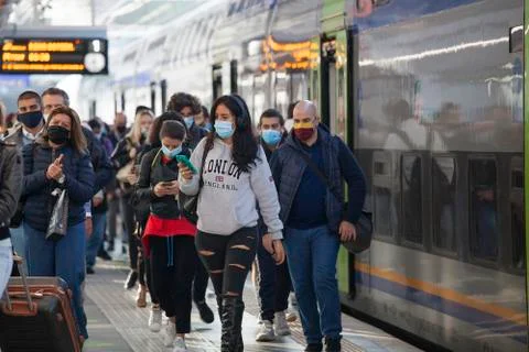 Commuters with protective face masks Stock Photos