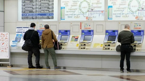 Commuters Purchasing Ticket Stock-Footage 115453636