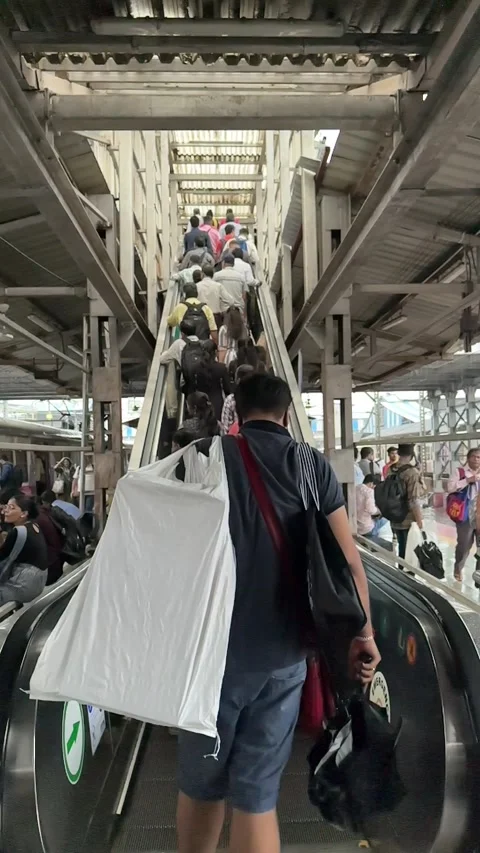 Commuters rush to board local train at Borivali station. 4K (Over crowded) Stock Footage 247123937