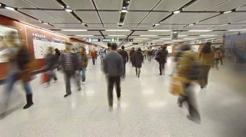 Commuters rushing through a busy subway station in Hong Kong, China Stock Footage 57229592