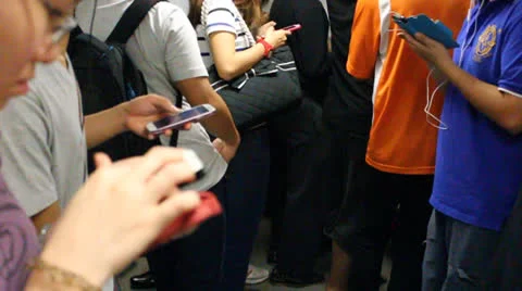 Commuters on subway using smart phones Video stock 24683952