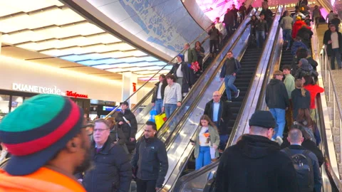 Commuters take elevator at the Penn Station during evening commute rush hours. Stock Footage 295925204