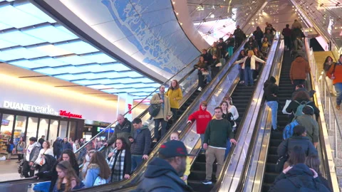Commuters take elevator at the Penn Station during evening commute rush hours. Stock Footage 295930563