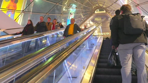 Commuters take elevator at the Penn Station during evening commute rush hours. Stock Footage 295933842