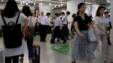 Commuters AT Tokyo Station Stock Footage 94433596