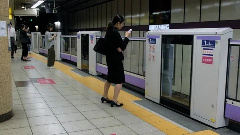 Commuters At Tokyo Subway Platform Stock Footage 111447265