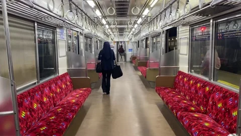 Commuters on a train platform during daily public transportation activity. Stock Footage 327263498