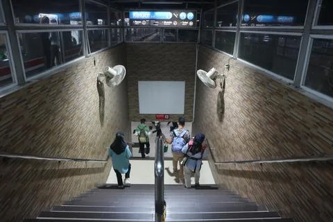 Commuters at Train Station Staircase Stock Photos