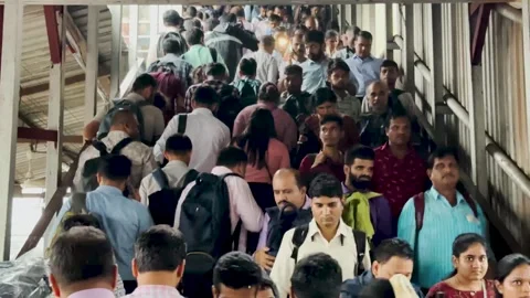Commuters travel on local train during peak hours. Video stock 252109775