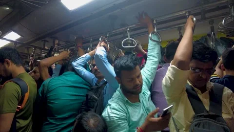 Commuters travel on local train during peak hours. Stock Footage 252885185