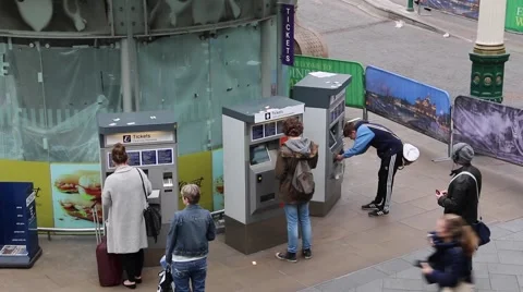 Commuters Using Ticket Machine Stock Footage 50185951