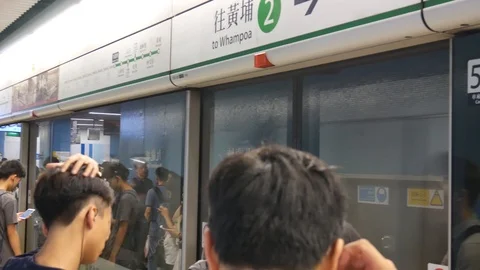 Commuters wait for Subway train in Hong Kong Stock Footage 101825878