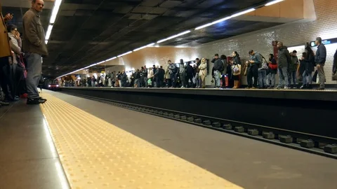 Commuters waiting for metro to arrive at Chiado station, Lisbon, Portugal Stock Footage 102145818