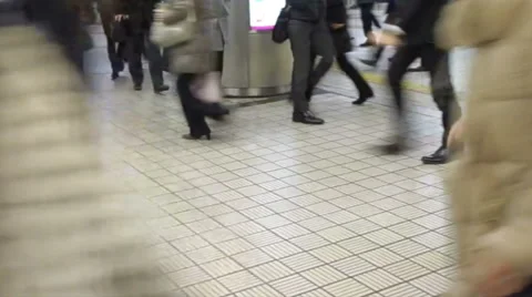 Commuters walking crossing in rush hour at subway transit station Stock Footage 52544279