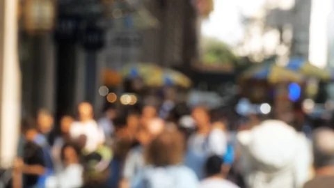 Commuters walking down busy city street people on sidewalk Stock Footage 94090360