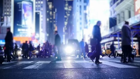 Commuters walking on streets of modern city Stock Footage