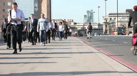 Commuters walking to work on London Bridge Video stock 21018094